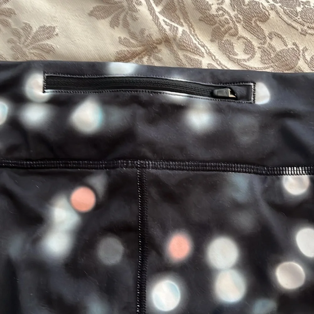 Nike Dri-Fit running pants, women’s size S/P, black with pink and gray - Picture 9 of 10